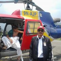 Captain with Helicopter at Pokhara Airport