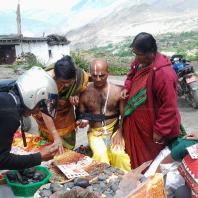 Buying shaligram at Muktinath